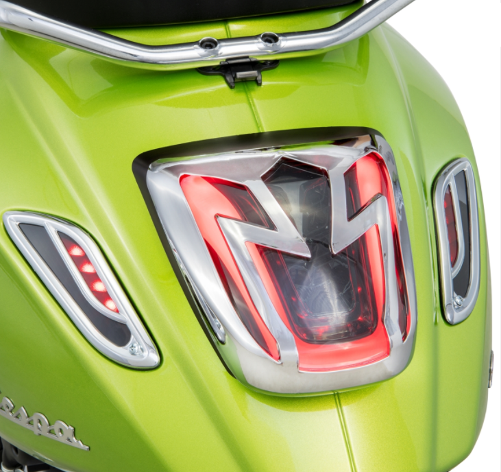 Griglia frecce destra/sinistra, posteriore per Vespa Primavera/​Sprint 50-150ccm 2T/​4T AC, cromata